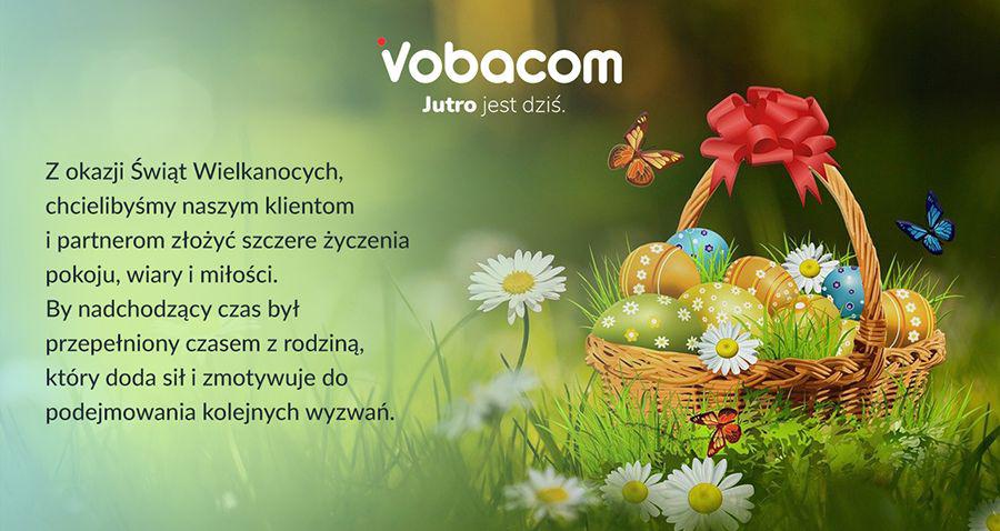 Kartka wielkanocna. Koszyk z malowanymi jajami.